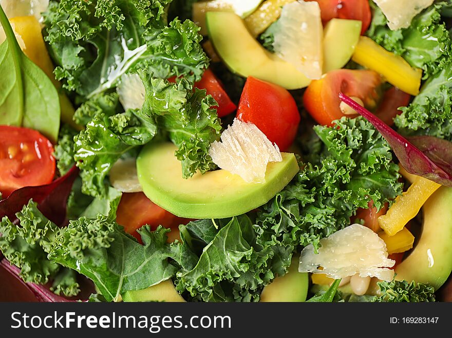 Tasty fresh kale salad as background, closeup
