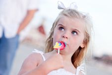 Little Girl Enjoying Her Lollipop Royalty Free Stock Photography Little Girl Enjoying Her Lollipop Royalty Free Stock Photography