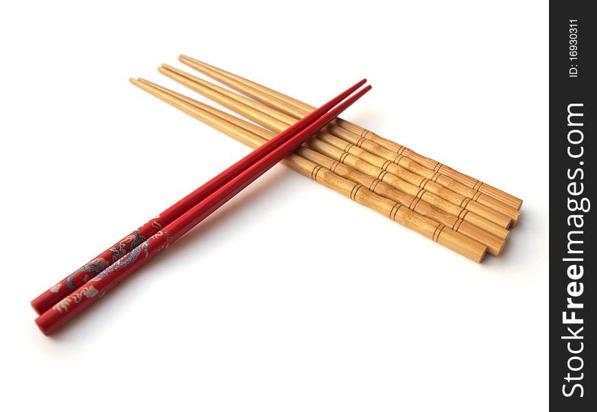 Several pairs of chopsticks isolated on white