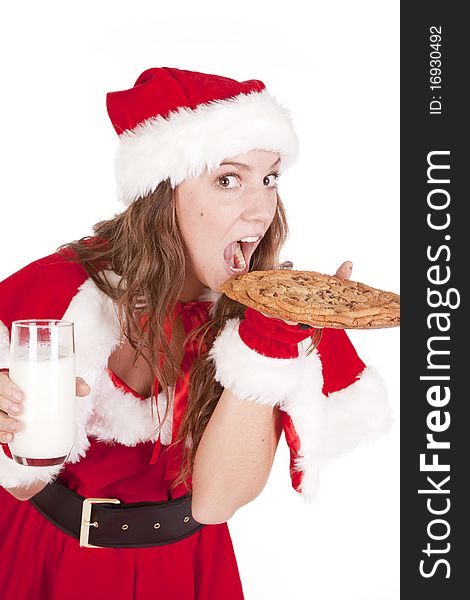 Mrs Santa eating big cookie