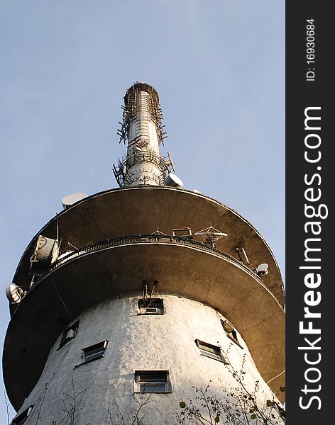 Communications tower with a beautiful blue sky.