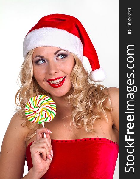 Beautiful blond girl in christmas costume in studio