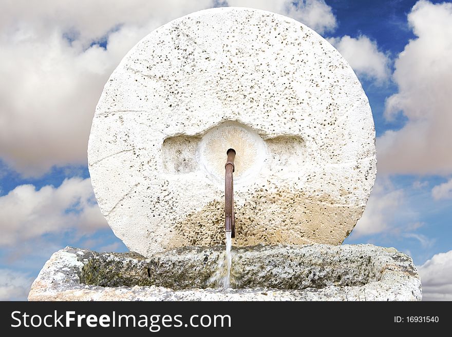 Fountain of life with background of clouds