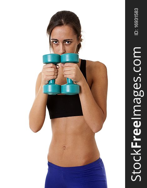 Close-up of a sports Woman working out with dumbbells. Close-up of a sports Woman working out with dumbbells