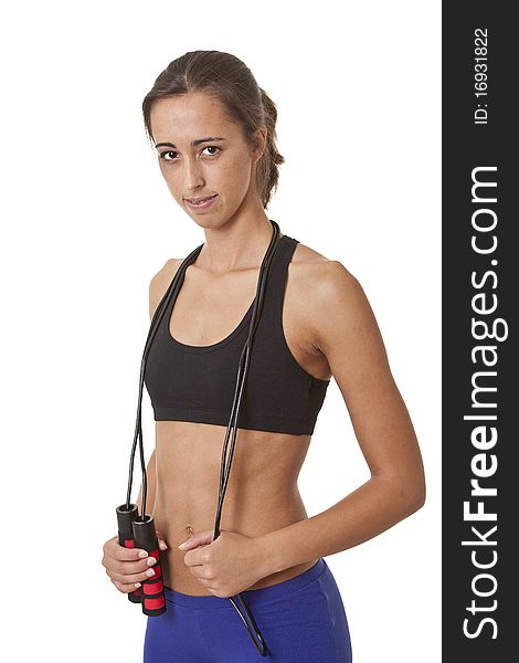 Sports Woman with jumping rope over her neck ready to work out