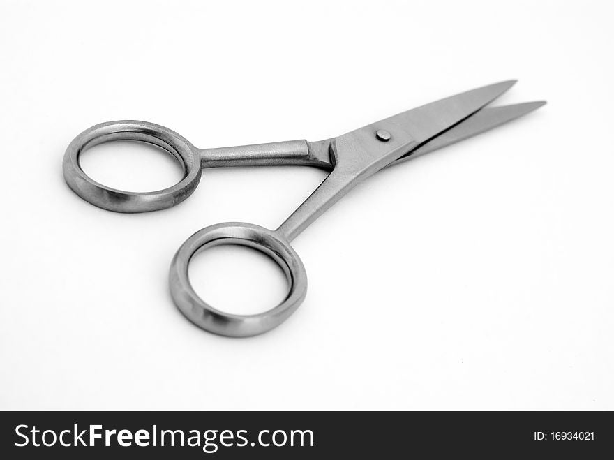 Isolated iron scissors close-up. B&W