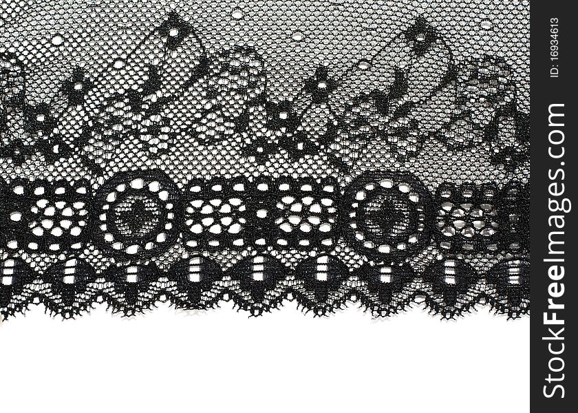 Decorative white lace on insulated black background