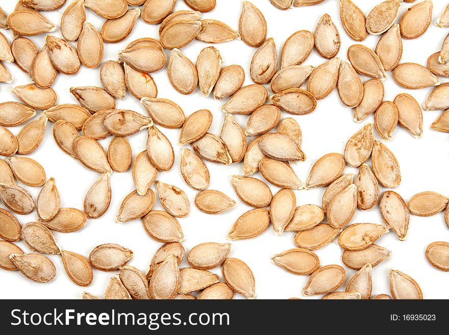 Pumpkin seed by disposit insulated on white background