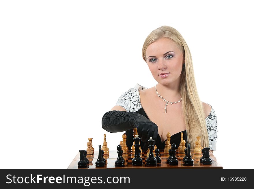 Young glamour blond woman play chess