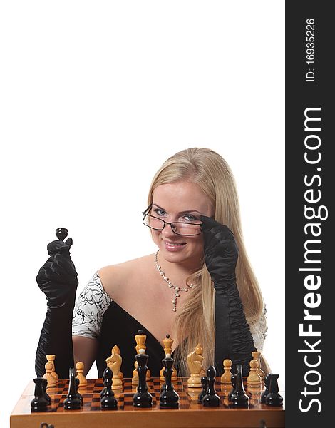 Young glamour blond woman play chess