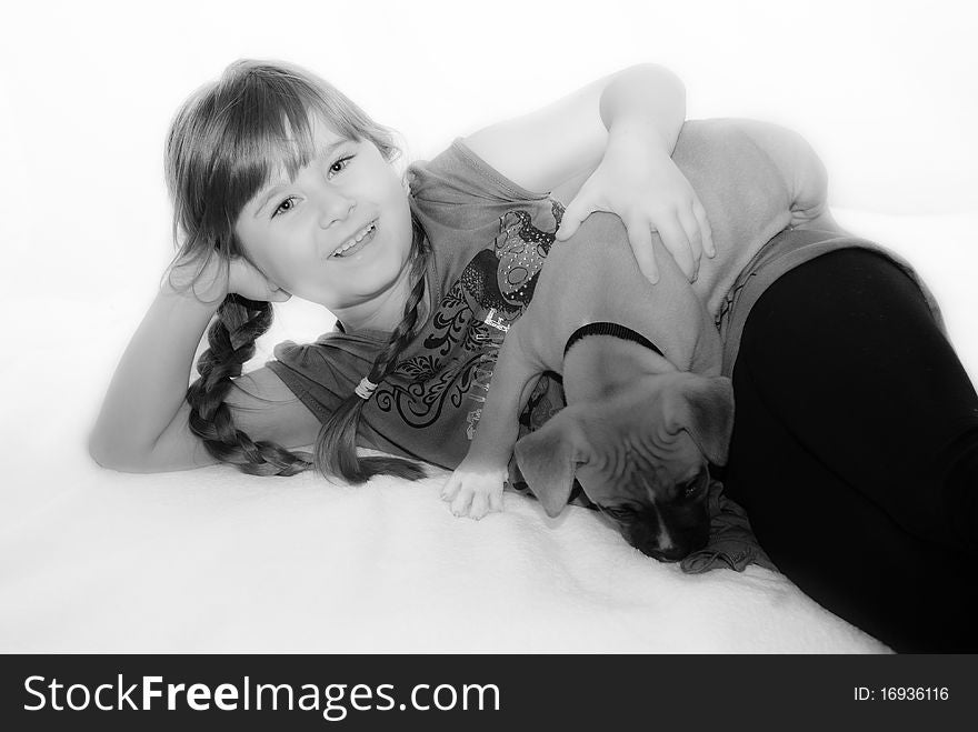 Portrait of a young girl and her puppy. Portrait of a young girl and her puppy