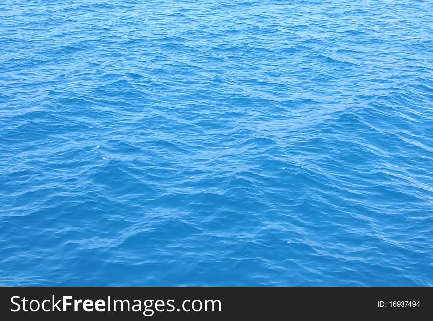 Blue wave background on a sea. Blue wave background on a sea