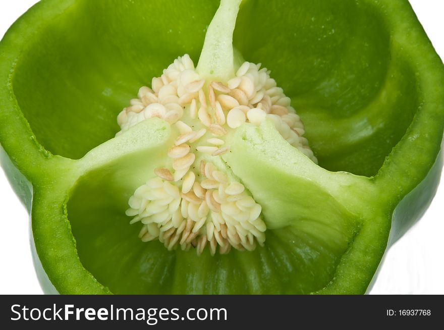 Close up of a green bell pepper cross section.