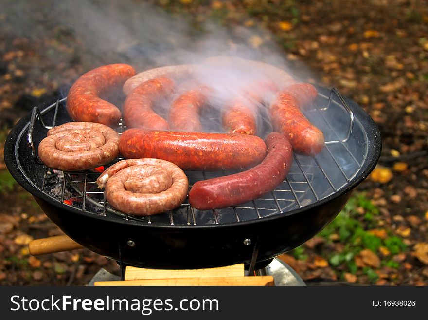 Barbecue sausages on mangal.