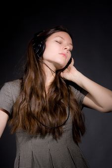 Girl In Headphones Listening Music Stock Photo