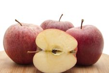 Halved Apple On Edge Board Royalty Free Stock Images Halved Apple On Edge Board Royalty Free Stock Images