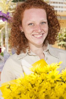 Woman Holding A Bunch Of Yellow Flowers Stock Photography Woman Holding A Bunch Of Yellow Flowers Stock Photography