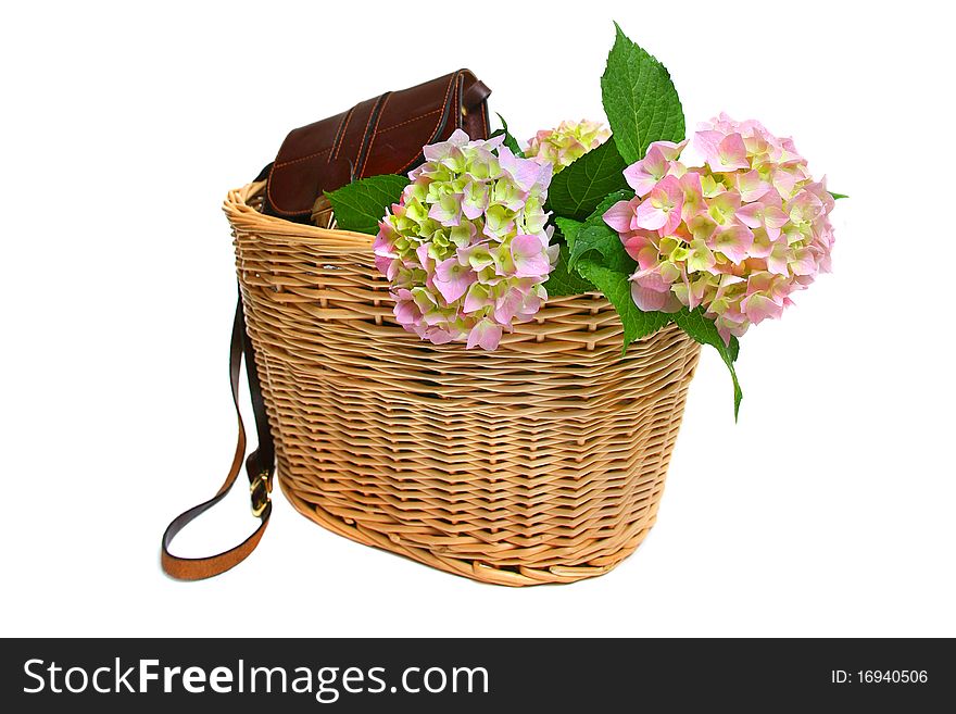 Basket full of flowers and a bag