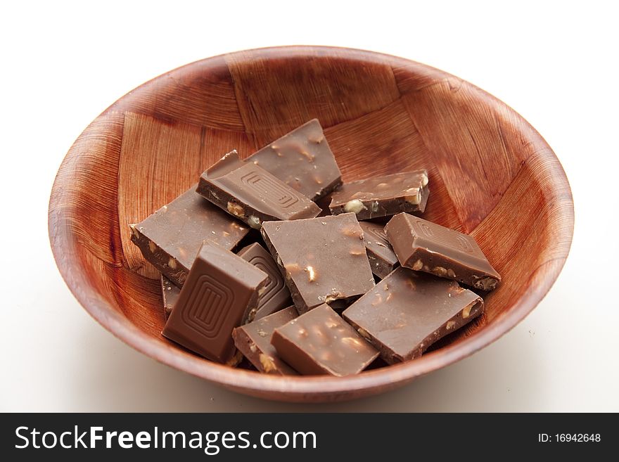 Nut chocolate in the wood bowl