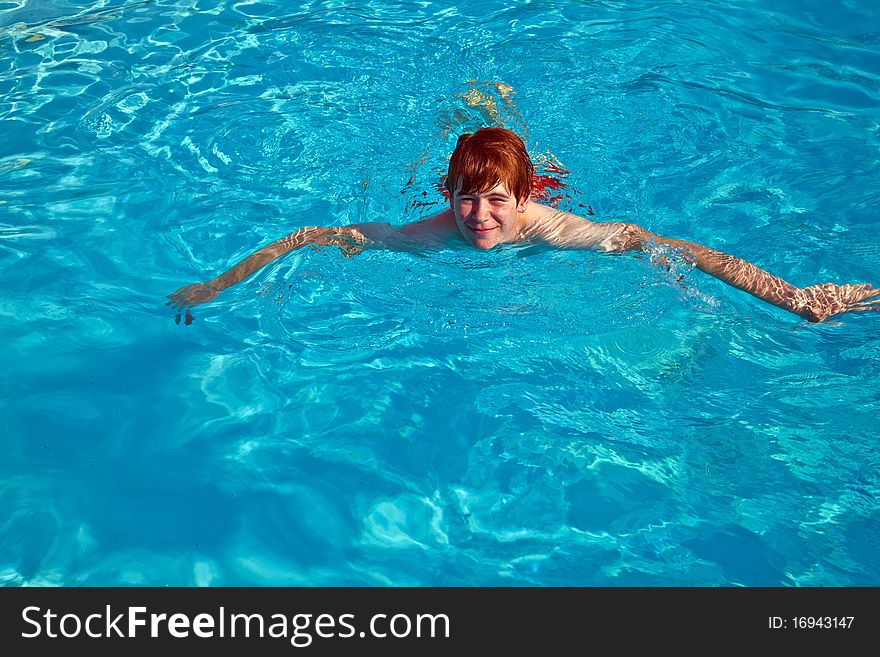 Child has fun in the pool