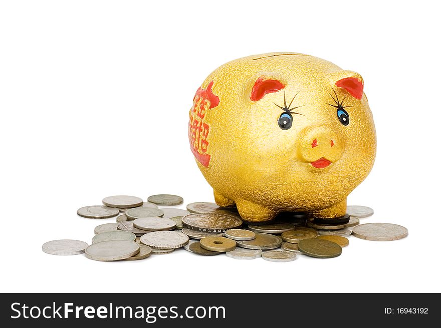 Old coins and a pig a coin box isolated over white