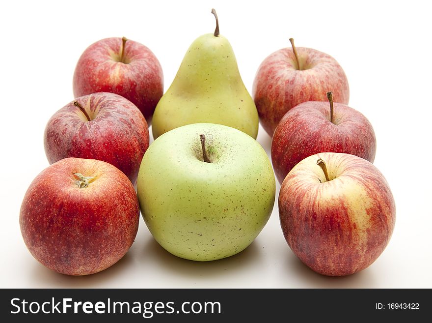 Red apples and green apple with pear. Red apples and green apple with pear