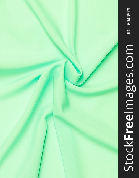 Abstract light green background made from satin. Abstract light green background made from satin