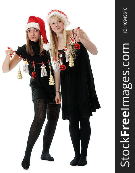 Two girls in hat santa with festoon