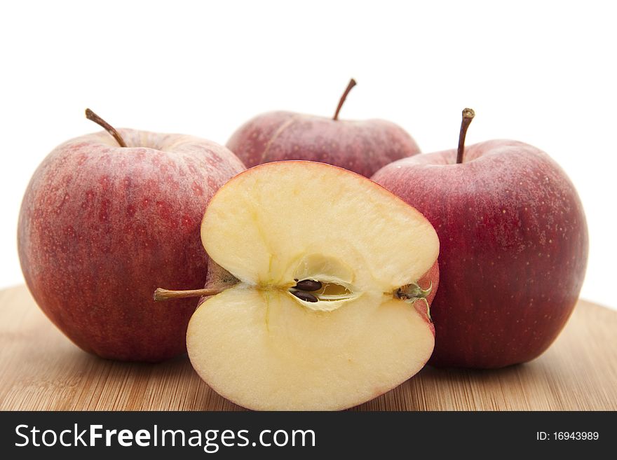 Halved Apple On Edge Board