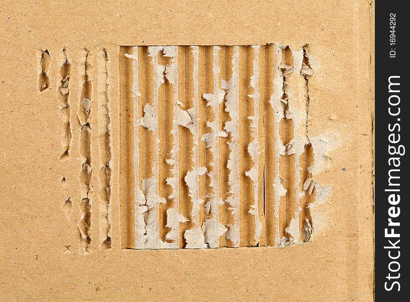 Textured cardboard frame with torn edges. Textured cardboard frame with torn edges