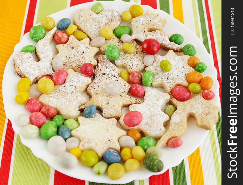 Christmas ginger pastries with the bright candies. Christmas ginger pastries with the bright candies