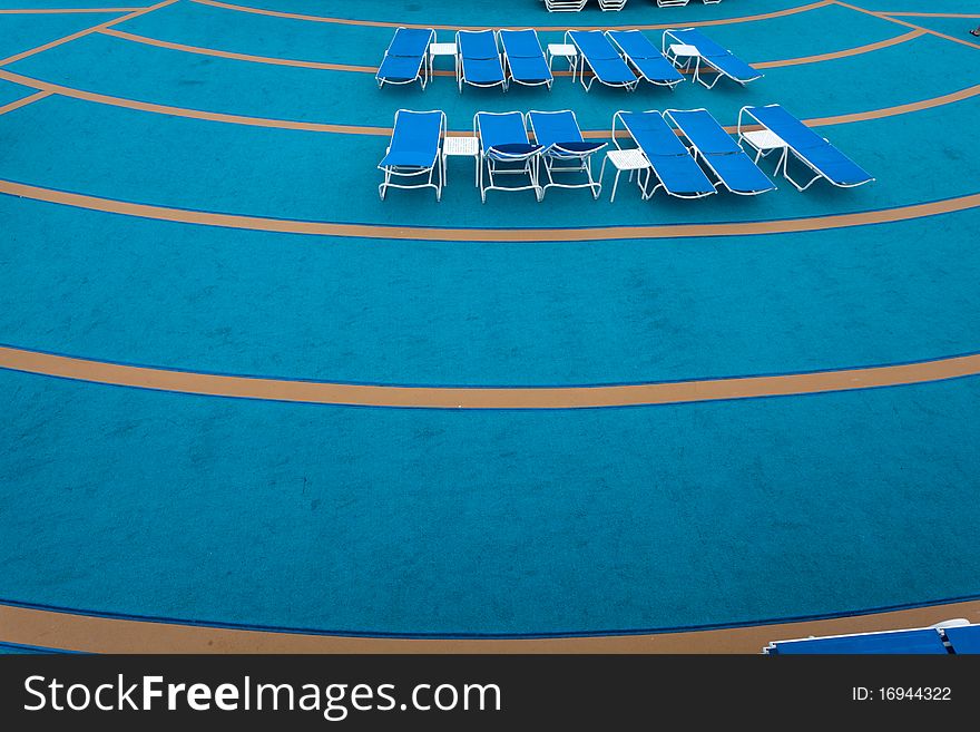 Sun Chairs and the deck of a cruise ship . Detail. Sun Chairs and the deck of a cruise ship . Detail