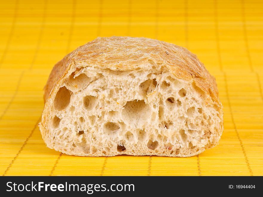 fresh bread isolated on yelloy background