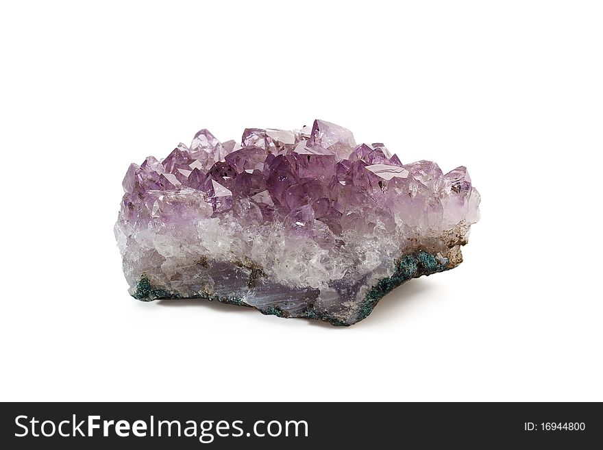 Crystals of amethyst are isolated on a white background