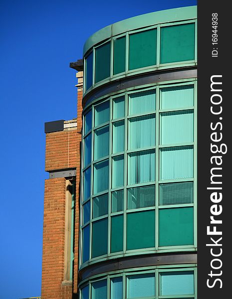 Image of a office building on a sunny day. Image of a office building on a sunny day