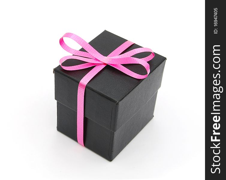 The black gift with handmade pink bow. The black gift with handmade pink bow