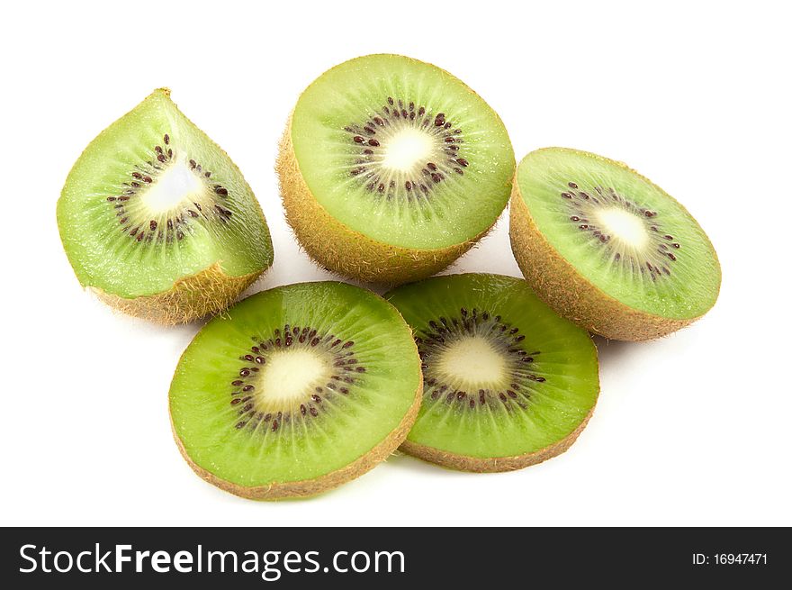 Kiwis, whole and slices on a white background. Kiwis, whole and slices on a white background