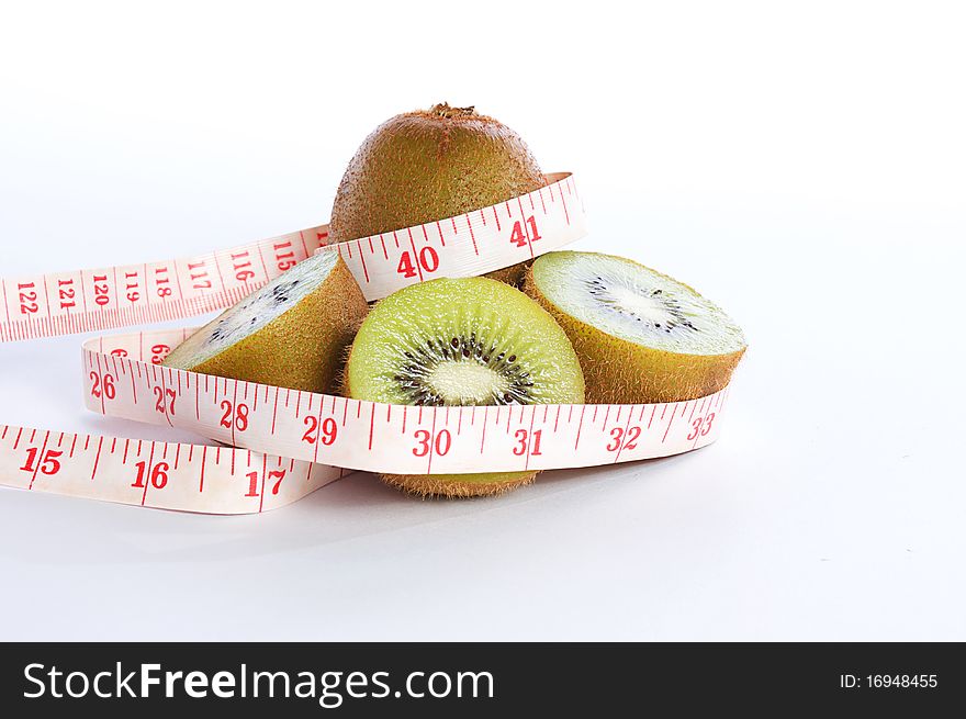 Kiwi tropical fruit and tape measurement