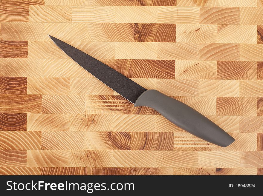 Series. kitchen knife isolated on wooden background. Series. kitchen knife isolated on wooden background