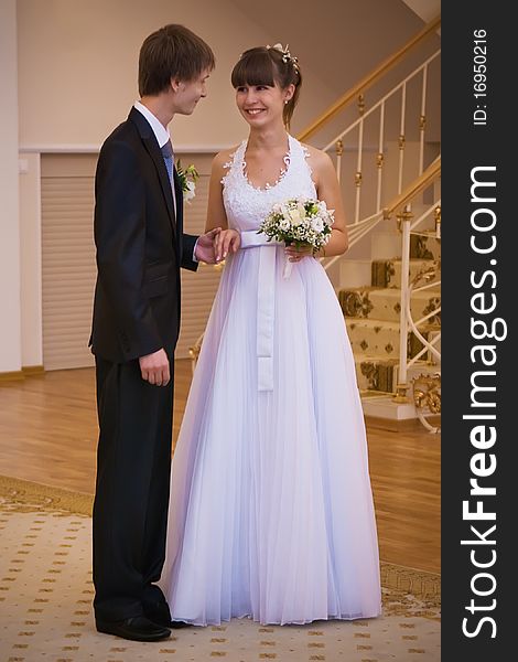 Newly-wed couple in a registry office. Newly-wed couple in a registry office