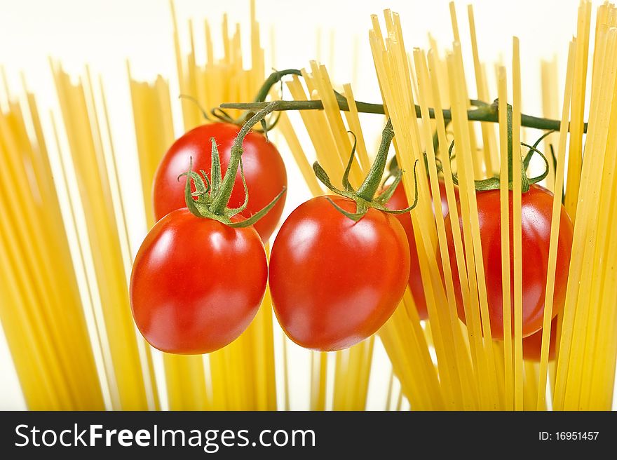 Fresh tomatoes in pasta 'grass'. Fresh tomatoes in pasta 'grass'