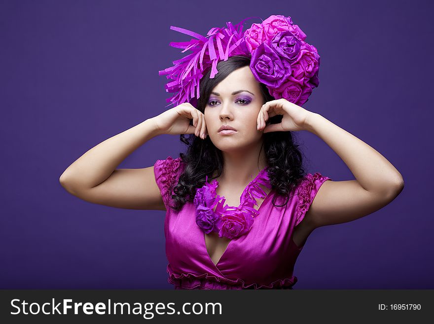 The image of a beautiful girl in a hat with roses