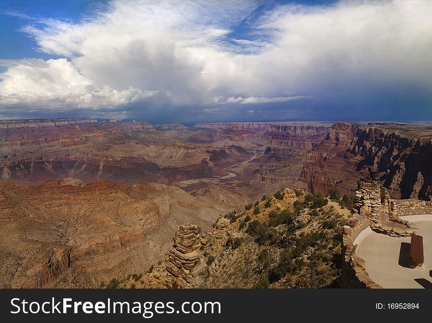 View from Desert View Tower in Grand Canyon, storm and rain at the horizon. View from Desert View Tower in Grand Canyon, storm and rain at the horizon.