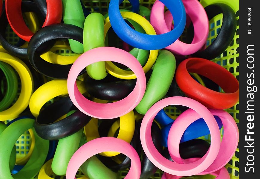 Trendy colorful wooden bracelets closeup