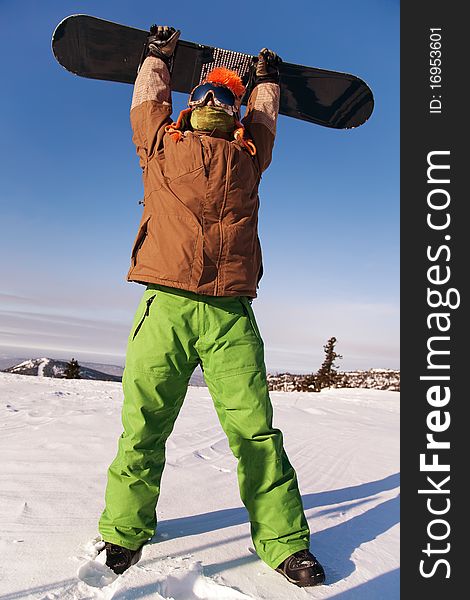 Portrait Of A Young Man With The Snowboard