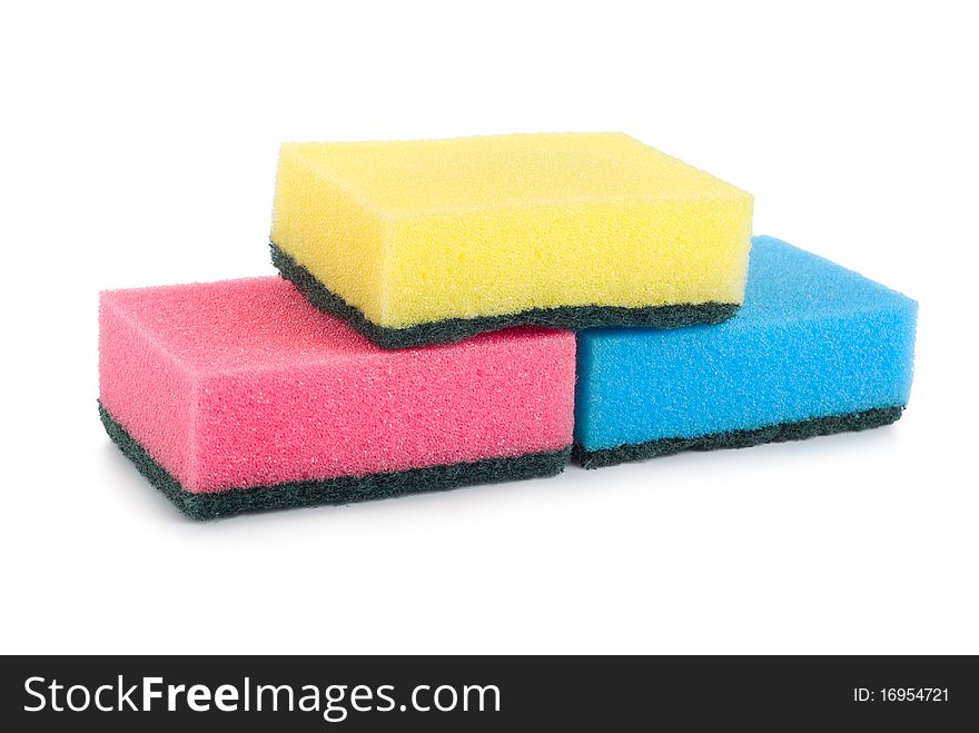 A three colored sponges isolated on white background