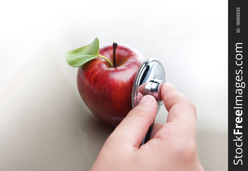 Mutant apple with stethoscope gentically product