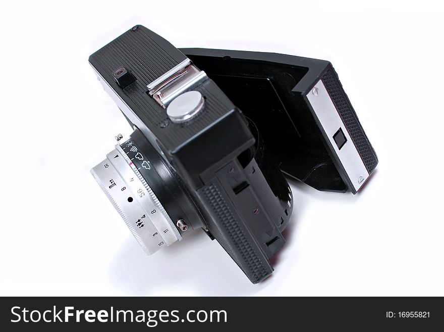 Open old black camera on a white background
