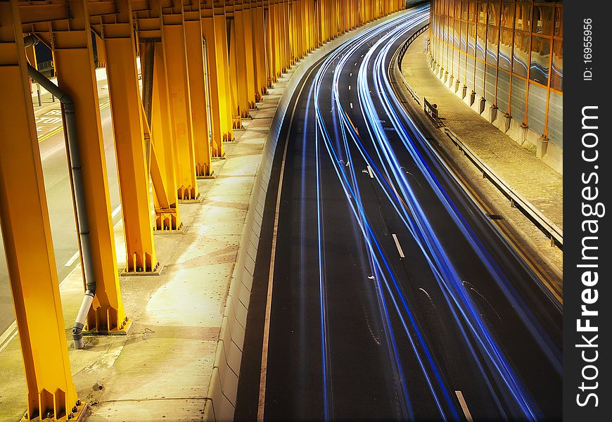 Traffic Car Light runs in Yellow Tunnel. Traffic Car Light runs in Yellow Tunnel