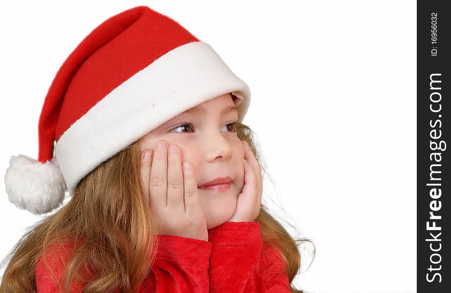 Little girl in Christmas hat , isolated on white